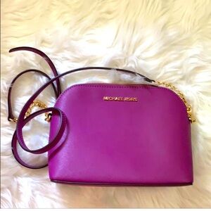 Michael kors cross body purse. Beautiful magenta color.